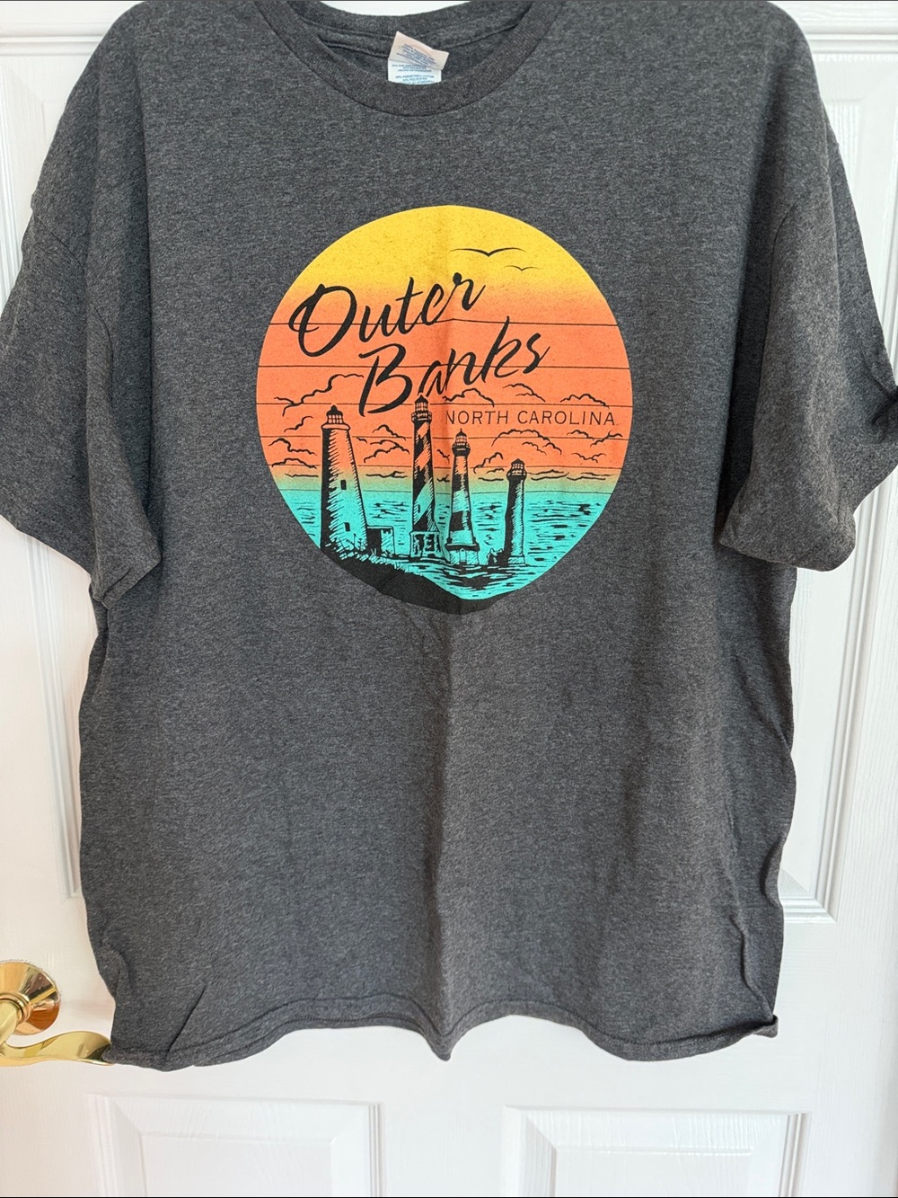 Delta Dark Gray Outer Banks Sunset Graphic Tee with Yellow Orange Teal Print